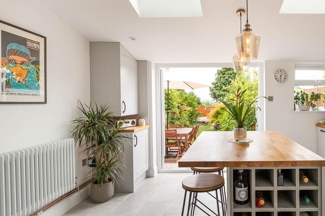 Bright Bristol kitchen extension with open garden doors and a clean tiled floor